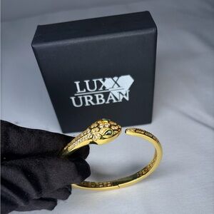 Gold-plated Snake Bangle: Green Zircon Eyes